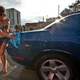 Illustration for article titled Noir Leather Bikini Car Wash Meetup Pictures